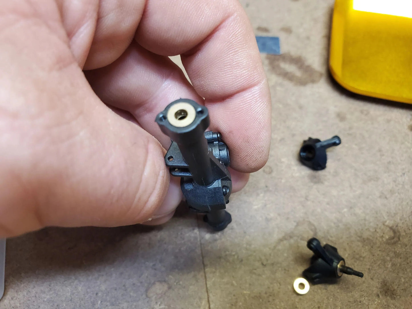 brass scx24 bearing installed into axle