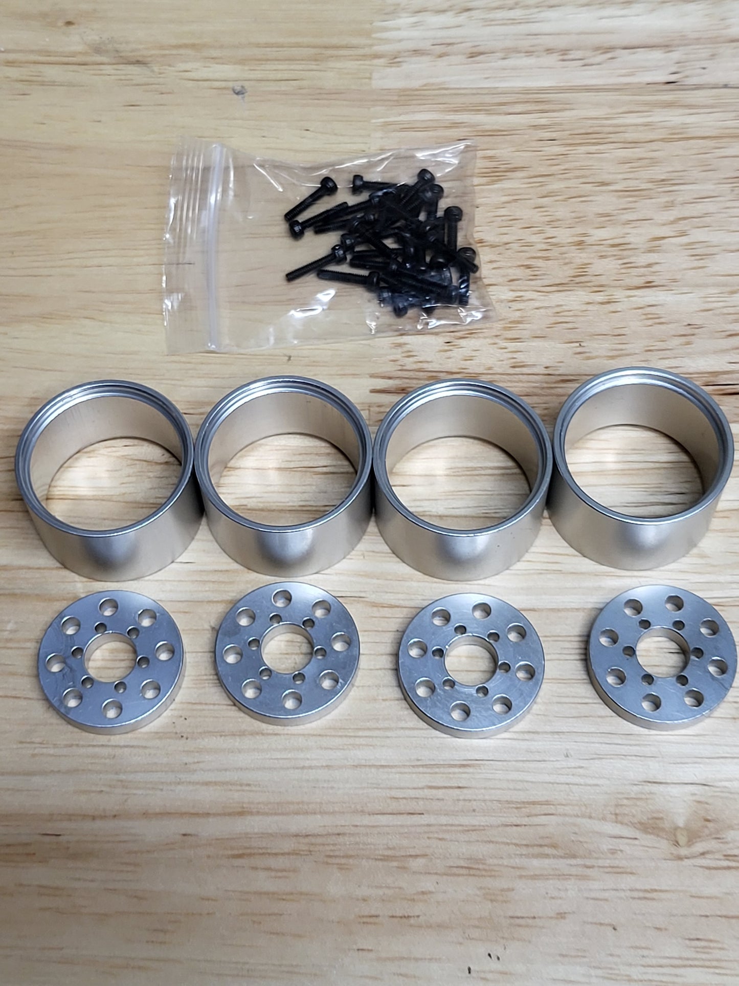 Island style wheel spacers and rings For UPW and DDP wheels, brass or aluminum