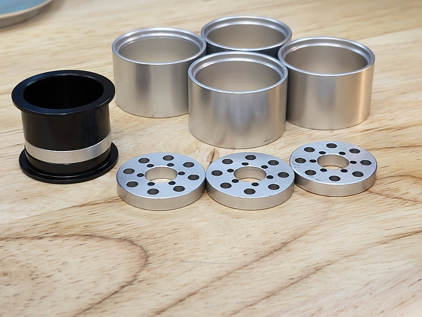 Island style wheel spacers and rings For UPW and DDP wheels, brass or aluminum